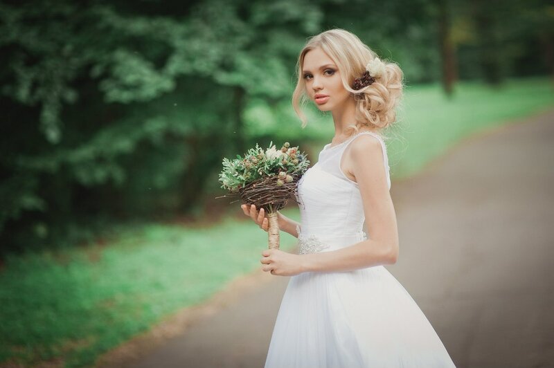 Blonde Bride Holding Bouquet — White, Serene