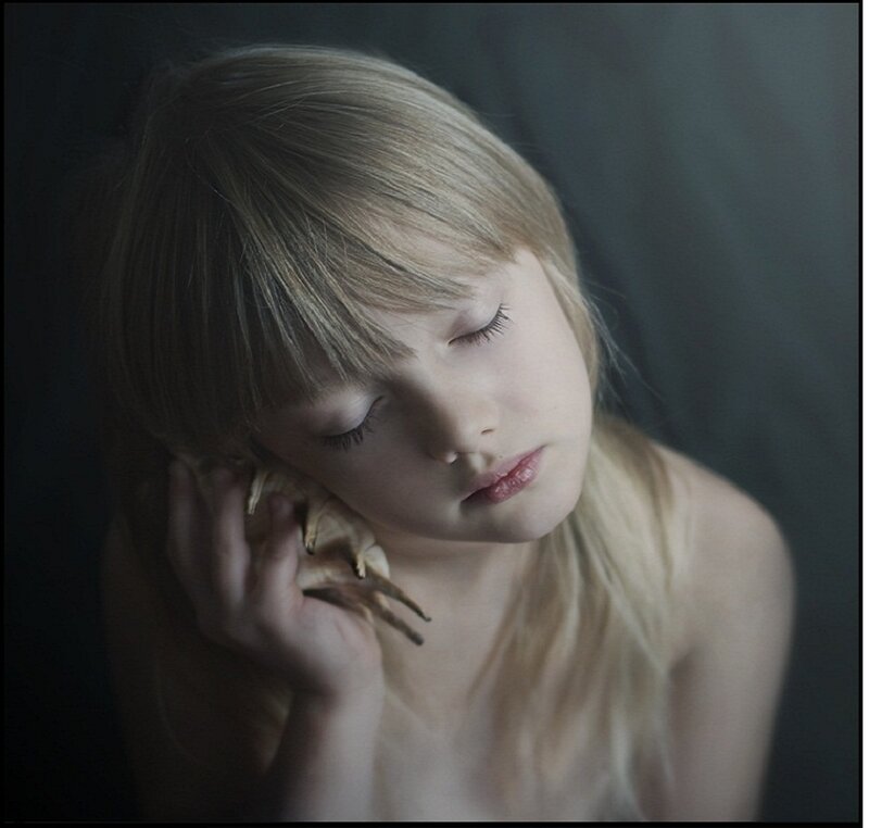 Blonde Child Holding Shell