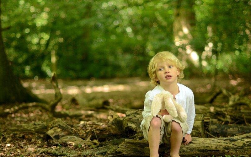 Blonde Child in Forest