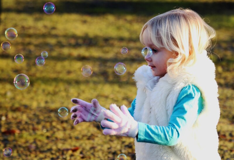 Blonde Child with Bubbles