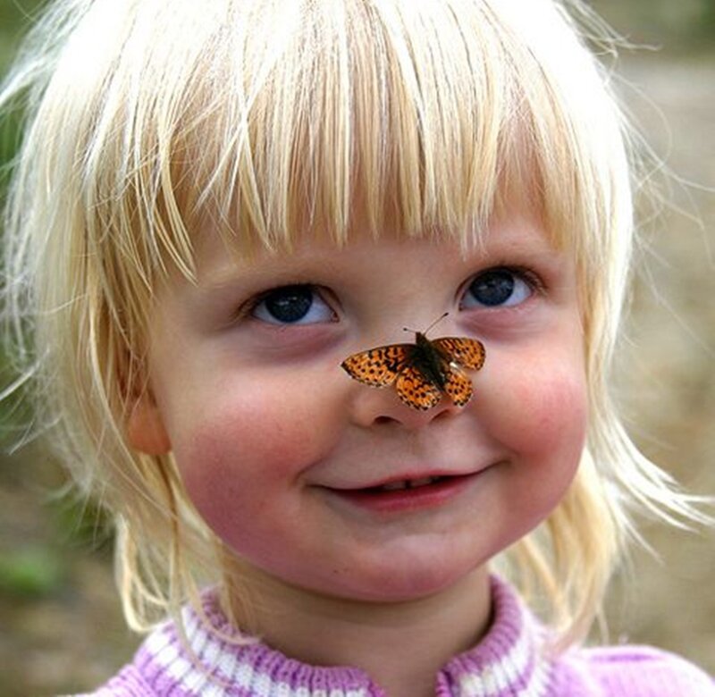 Blonde Child with Butterfly