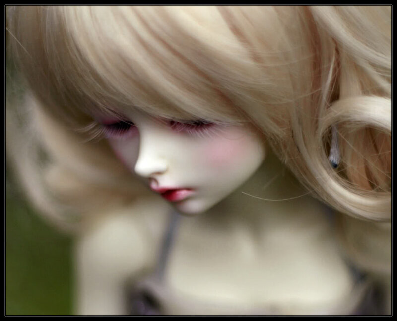 Blonde Doll with Closed Eyes