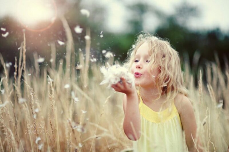 Blonde Girl Blowing Dandelion — Yellow
