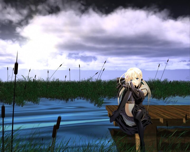 Blonde girl by the lake