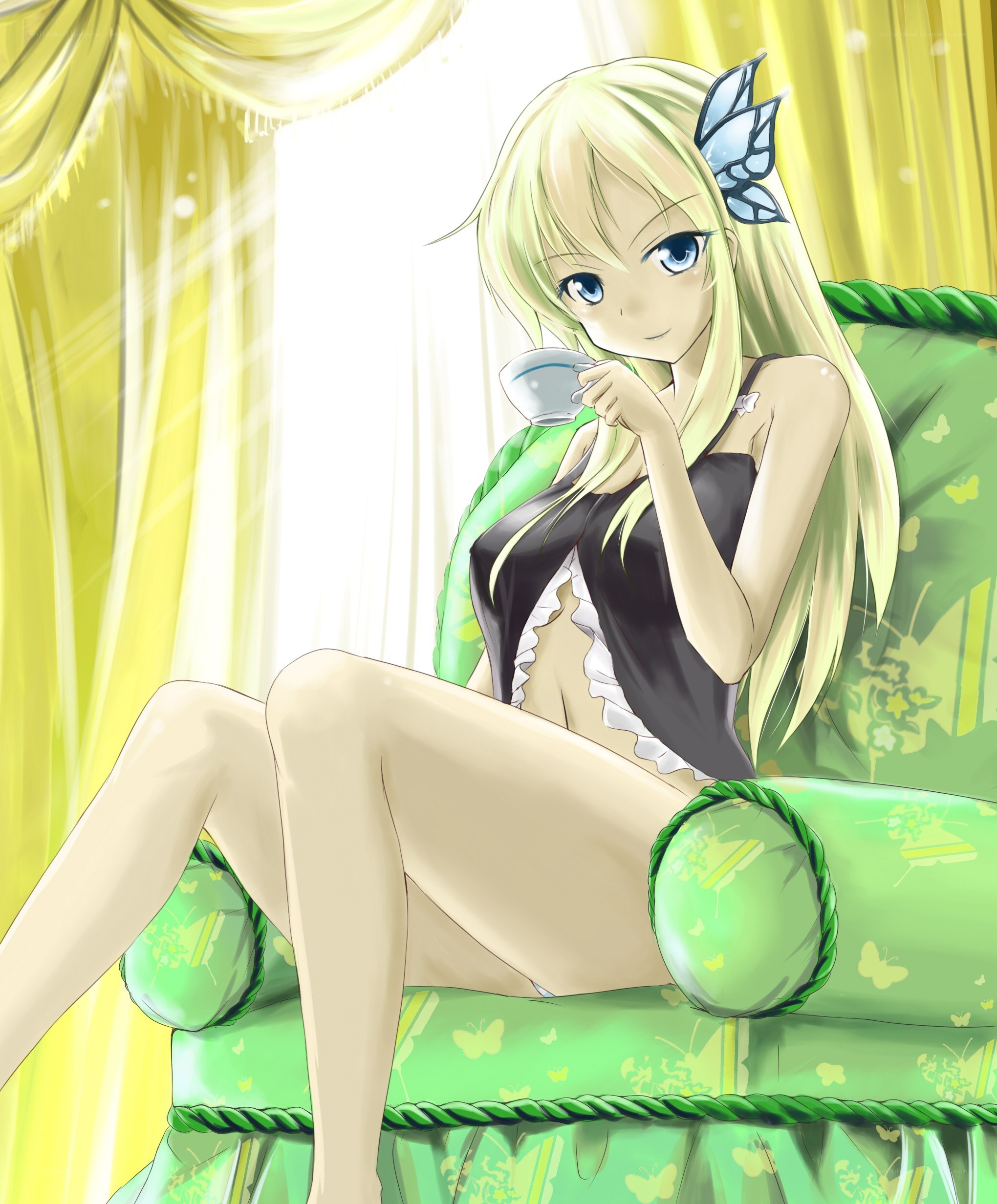 Blonde girl drinking tea