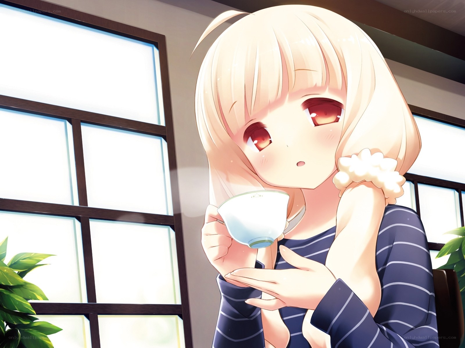blonde girl drinking tea