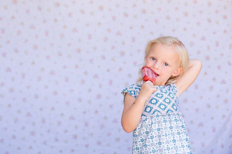 Blonde Girl Eating Popsicle