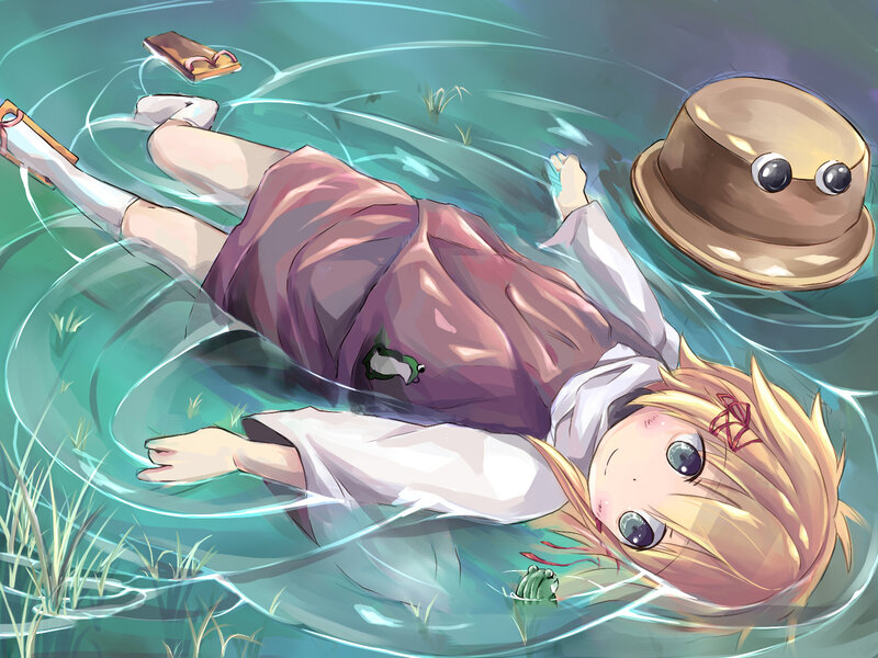 Blonde Girl Floating in Water