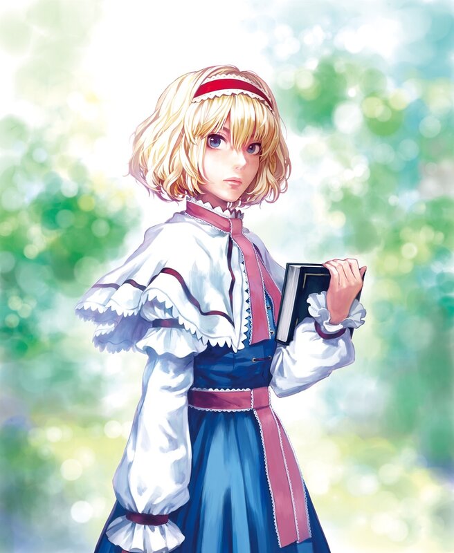 blonde girl holding a book