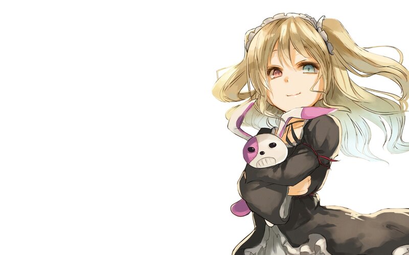 blonde girl holding a plush toy