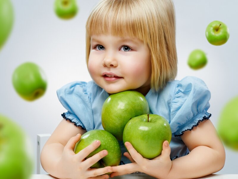 Blonde Girl Holding Apples — Green