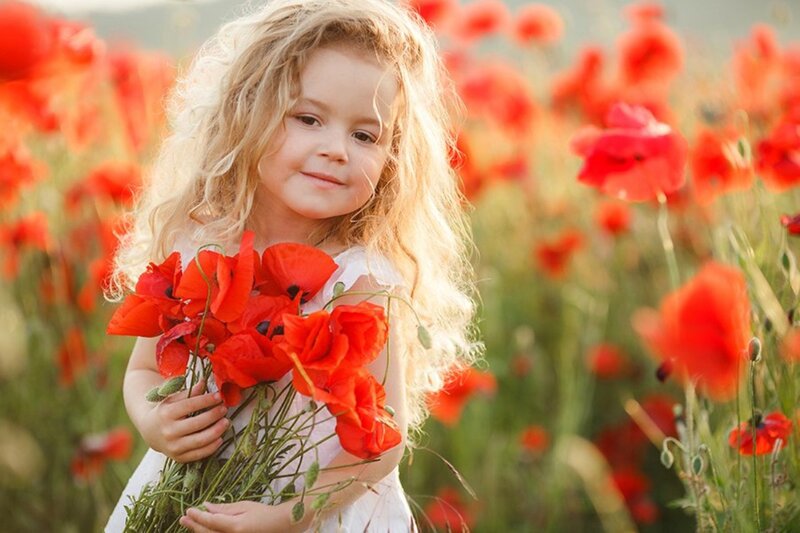 Blonde Girl Holding Poppies
