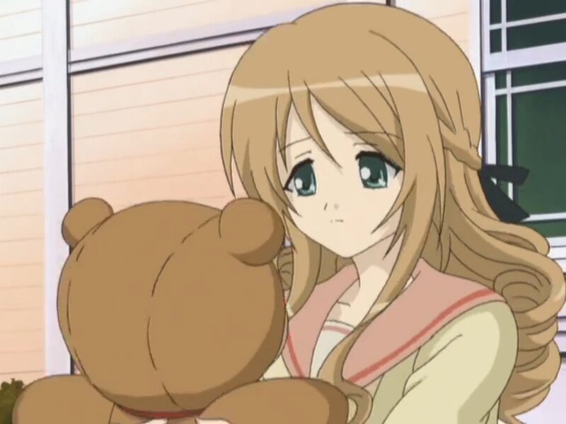 Blonde Girl Holding Teddy Bear — Brown