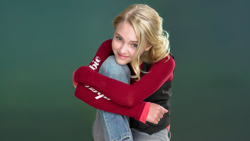 Blonde Girl Hugging Knees