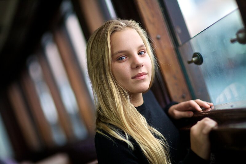 Blonde Girl in Black Sweater