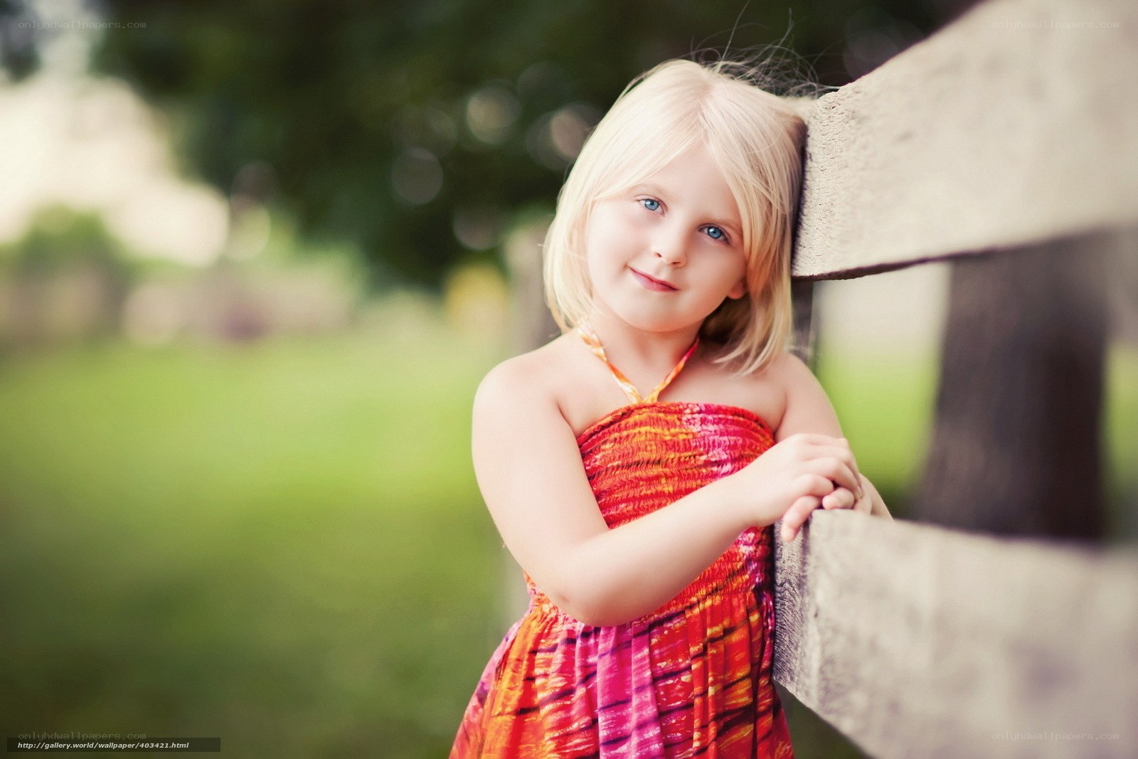 blonde girl in colorful dress