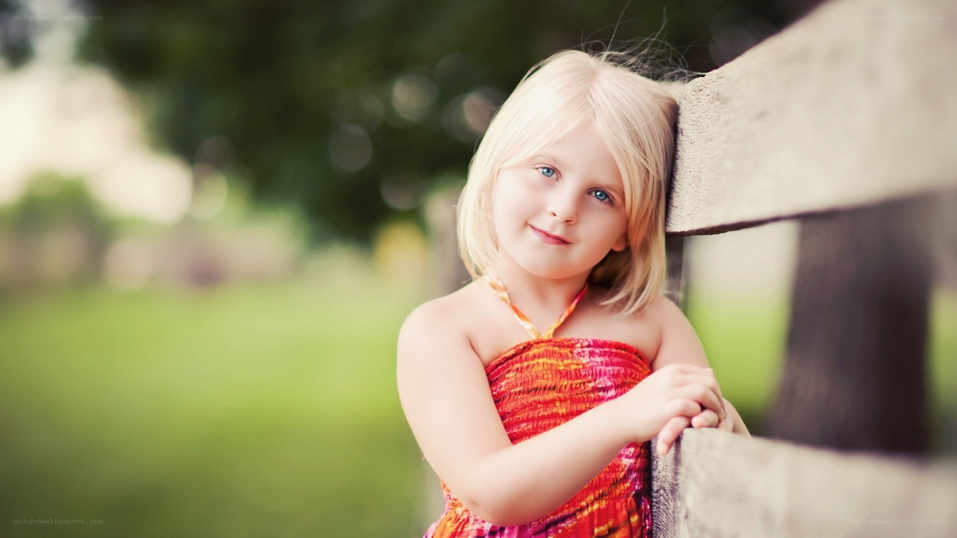 blonde girl in colorful dress