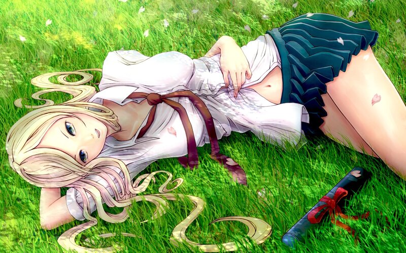 Blonde girl in grass