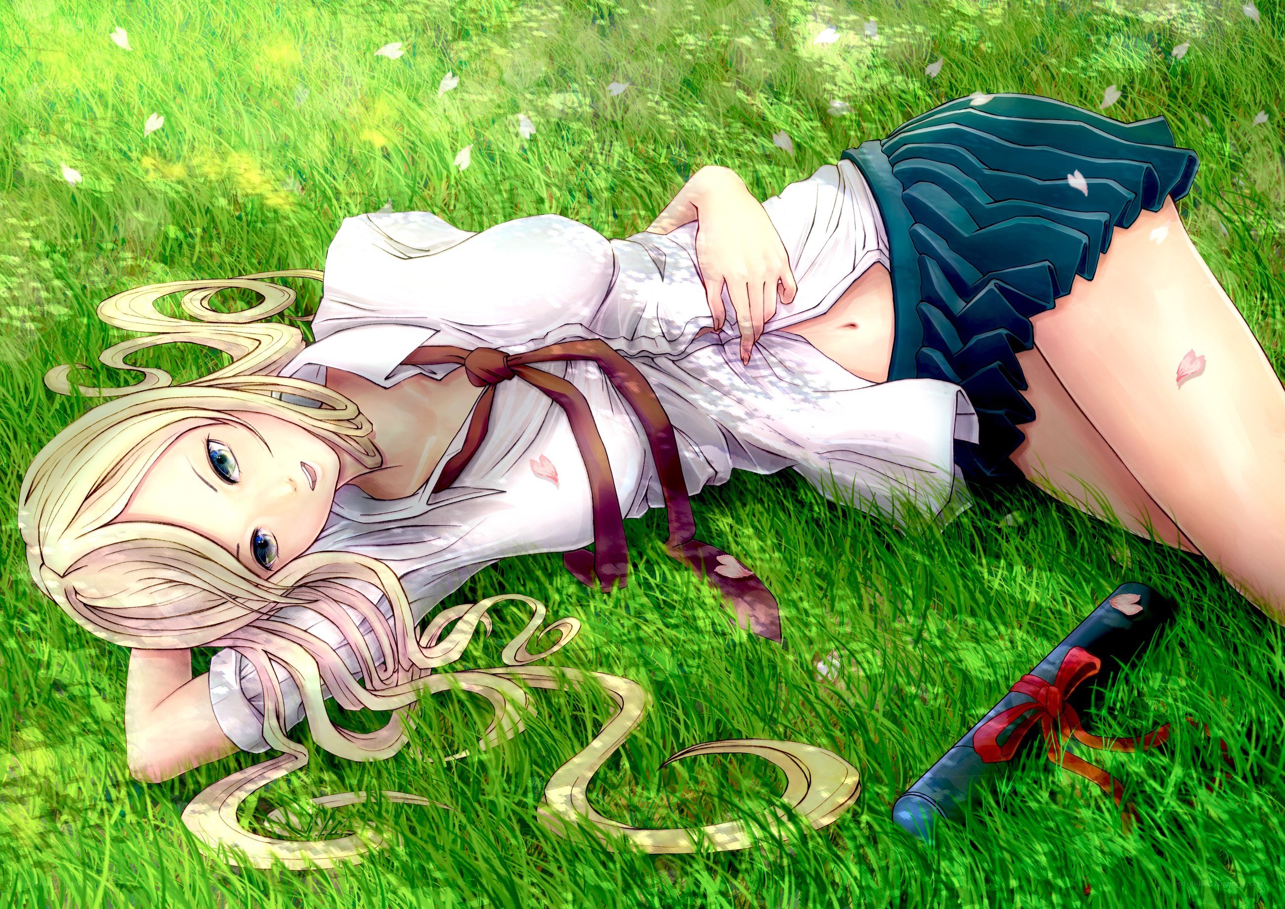 Blonde girl in grass