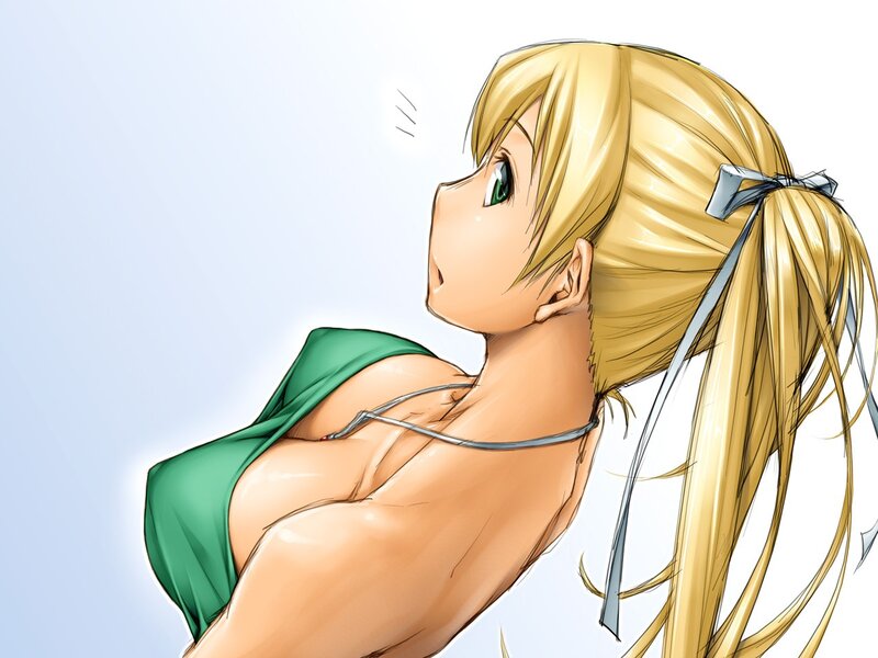blonde girl in green top
