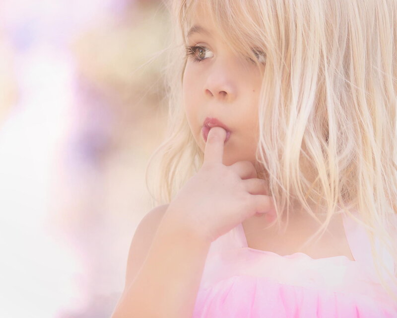 Blonde Girl in Pink Dress — Thoughtful