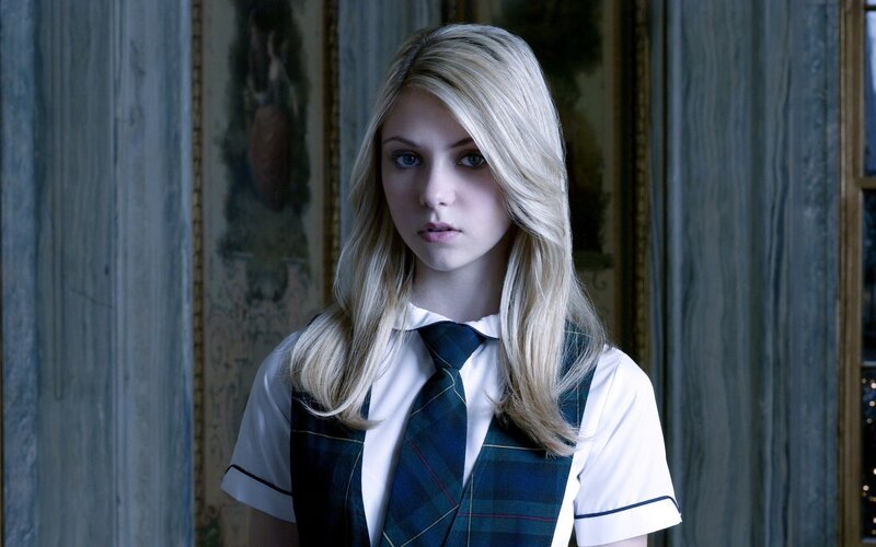 blonde girl in school uniform
