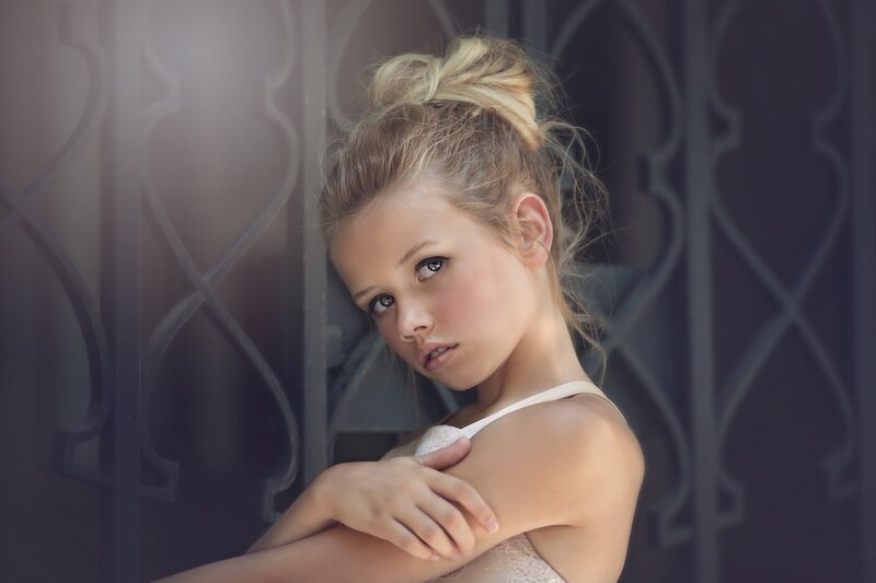 Blonde Girl in White Top