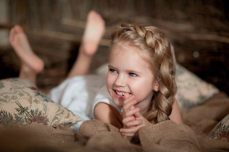 Blonde Girl Lying Down — Brown, Playful