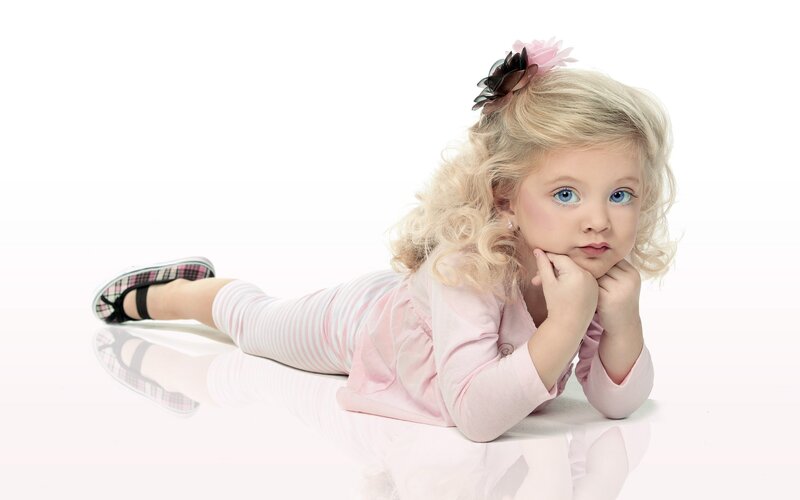 Blonde Girl Lying Down — Pink, Neutral, Photograph