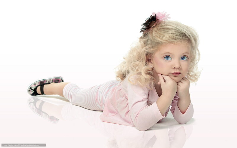 blonde girl lying on floor