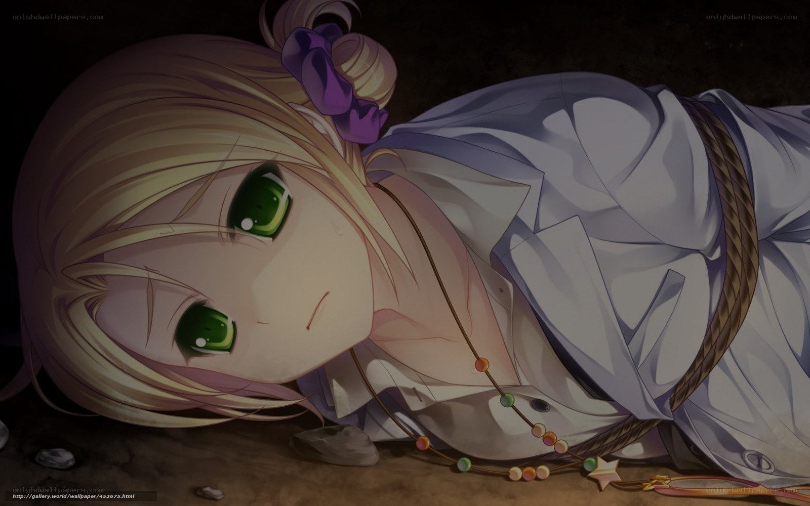blonde girl lying on ground