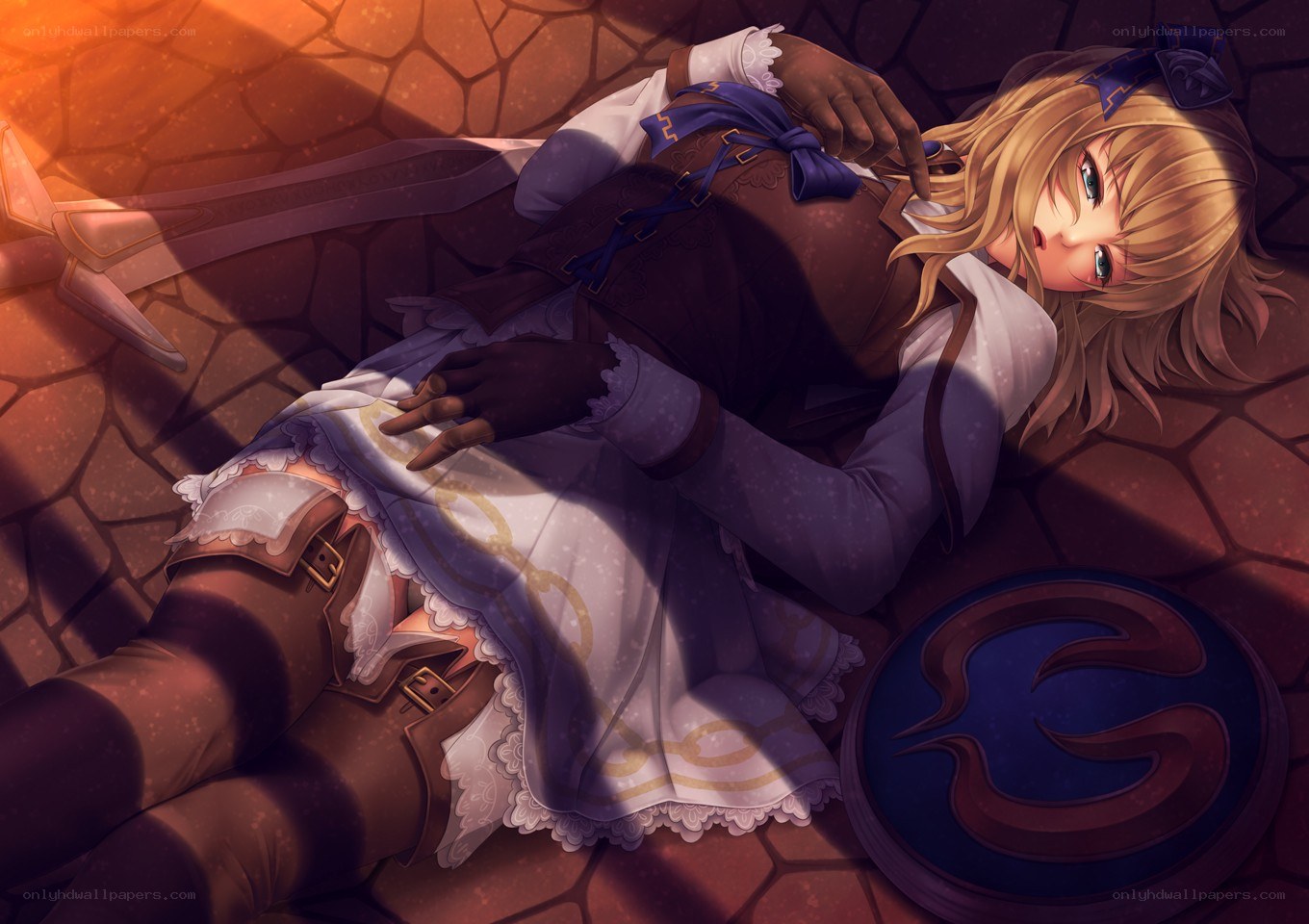 Blonde girl lying on the ground