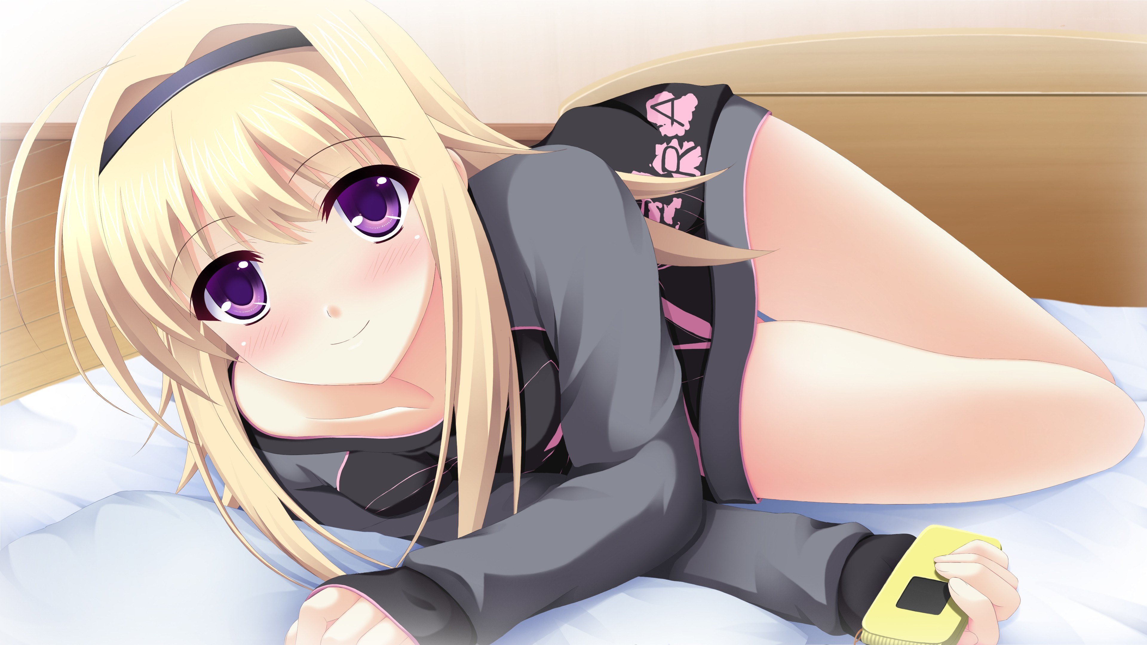 blonde girl on bed
