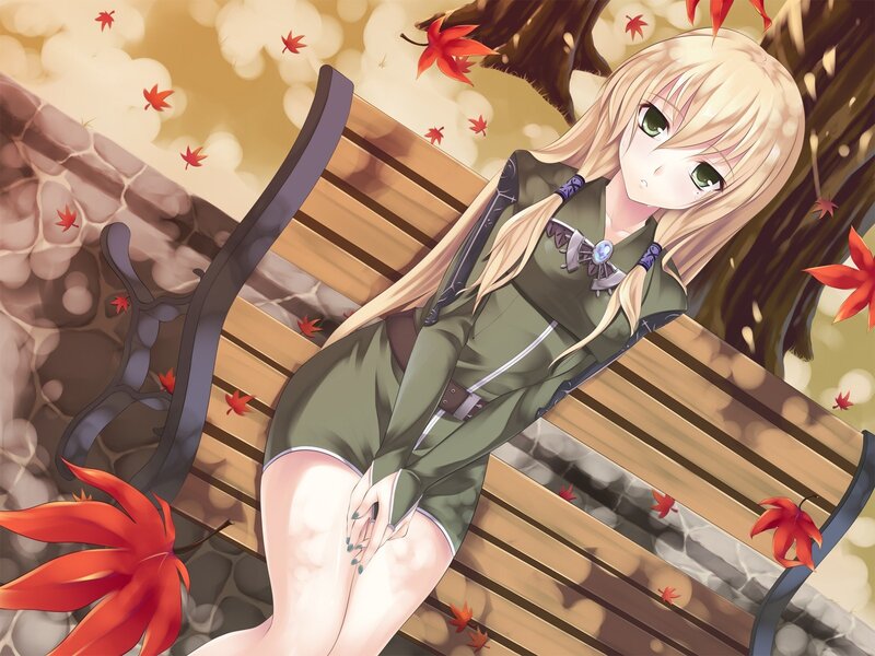 Blonde girl on bench in autumn