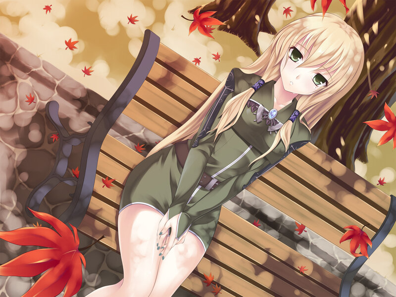 Blonde girl on bench in autumn