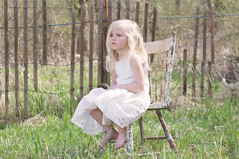 Blonde Girl on Chair