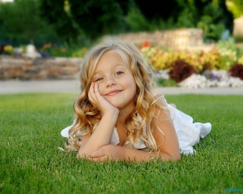 Blonde Girl on Grass