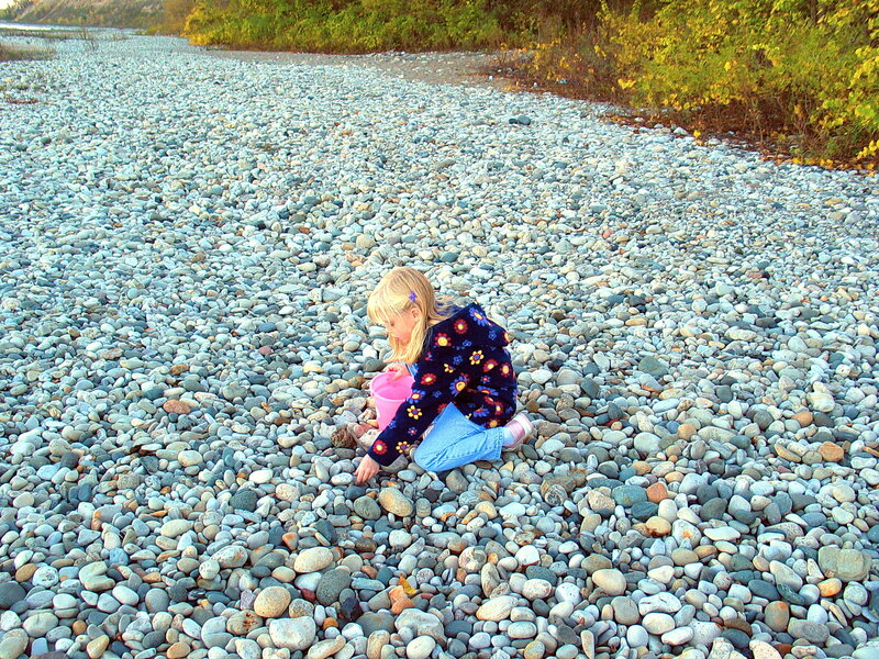 Blonde Girl on Pebbles