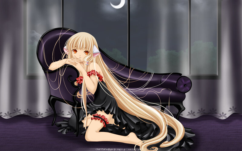 Blonde girl on purple couch
