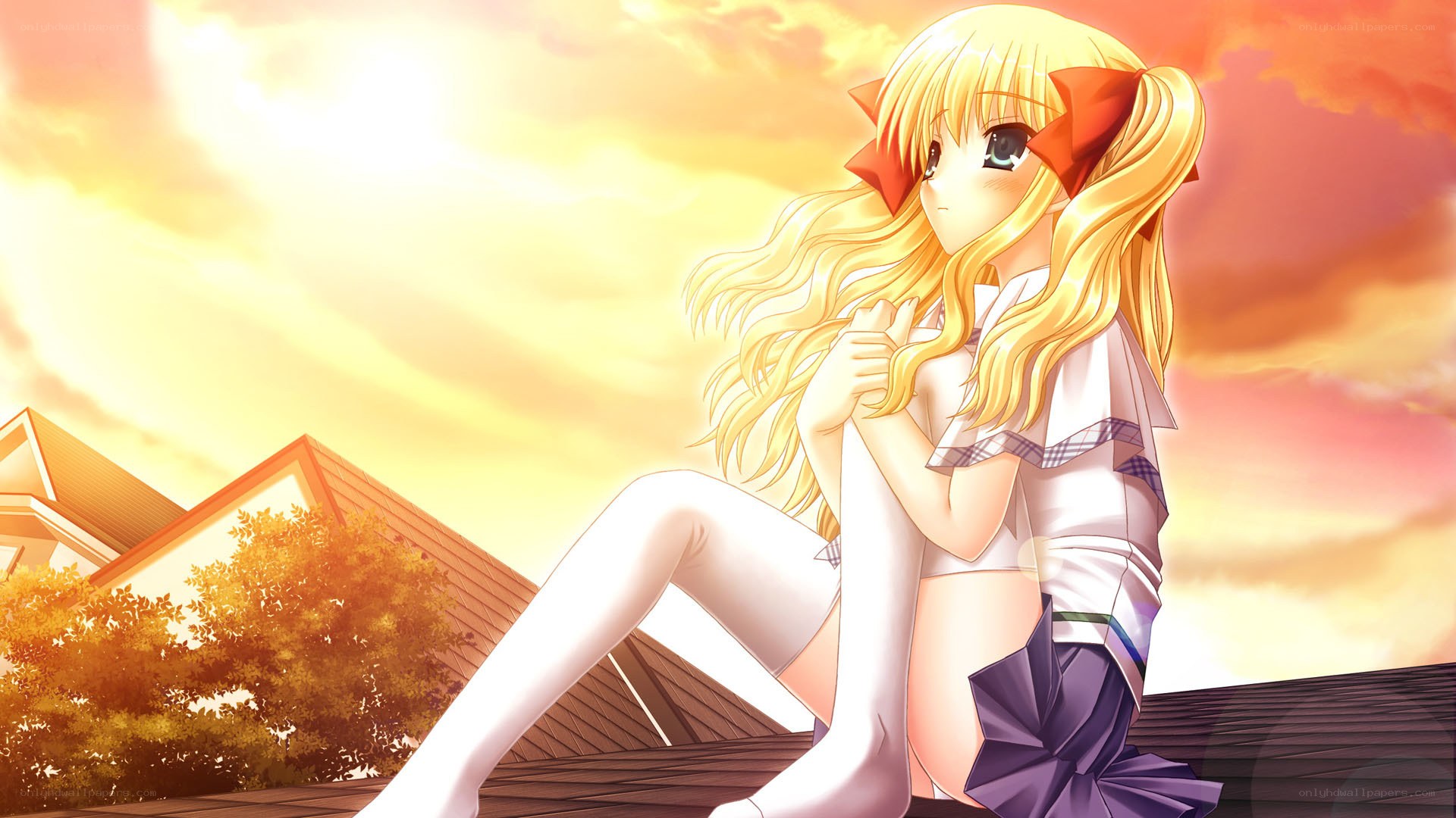 blonde girl on rooftop at sunset