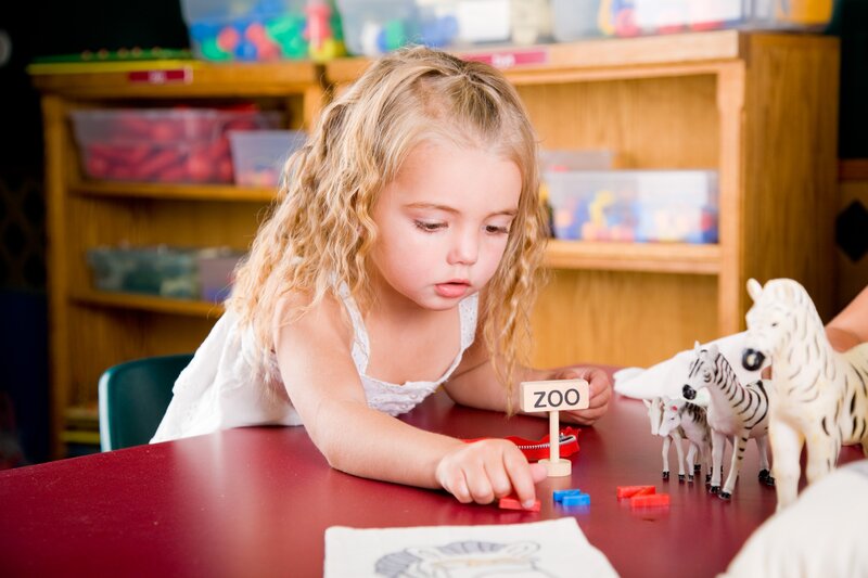 Blonde Girl Playing