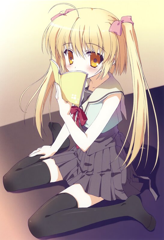 blonde girl reading book