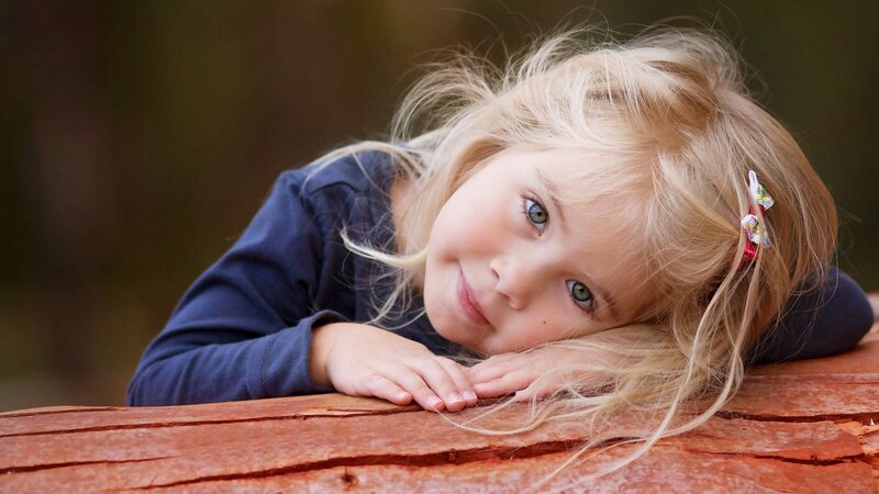 Blonde Girl Resting — Brown