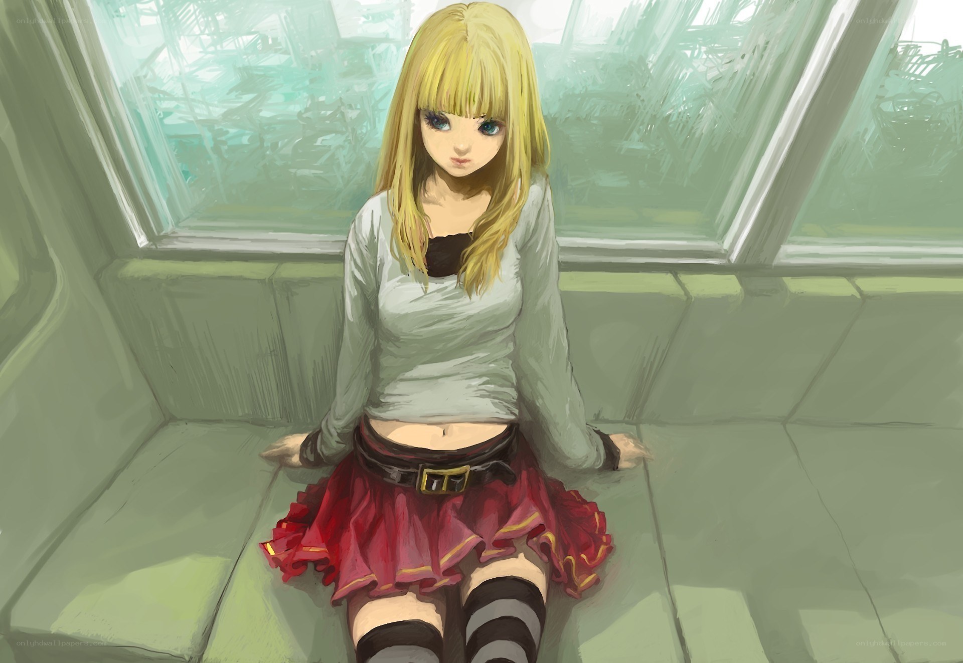 Blonde girl sitting on a bench