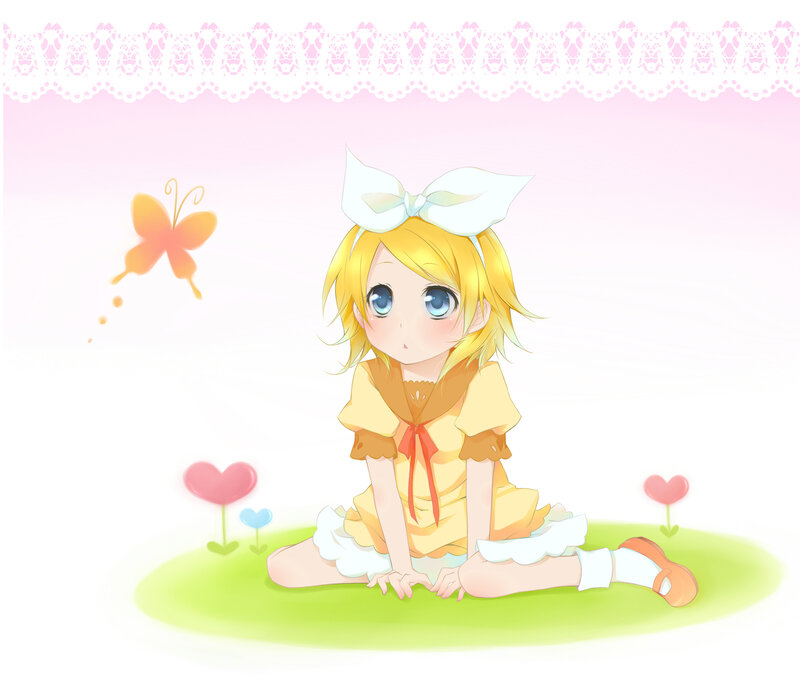 Blonde Girl Sitting on Grass