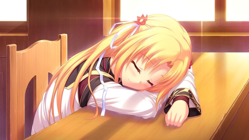 blonde girl sleeping at desk
