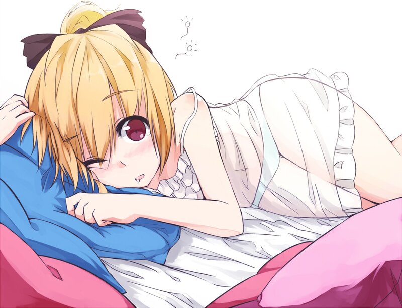 blonde girl sleeping in bed