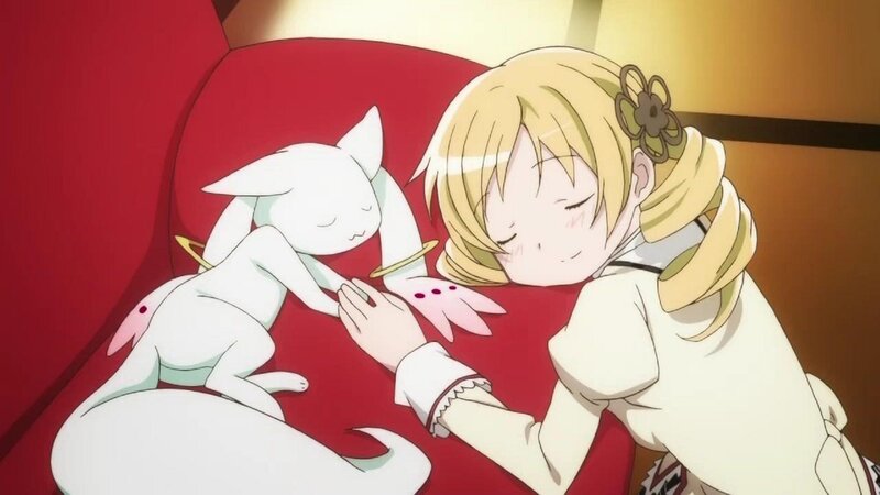 Blonde girl sleeping with a white creature