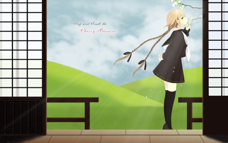 Blonde Girl Smelling Blossoms
