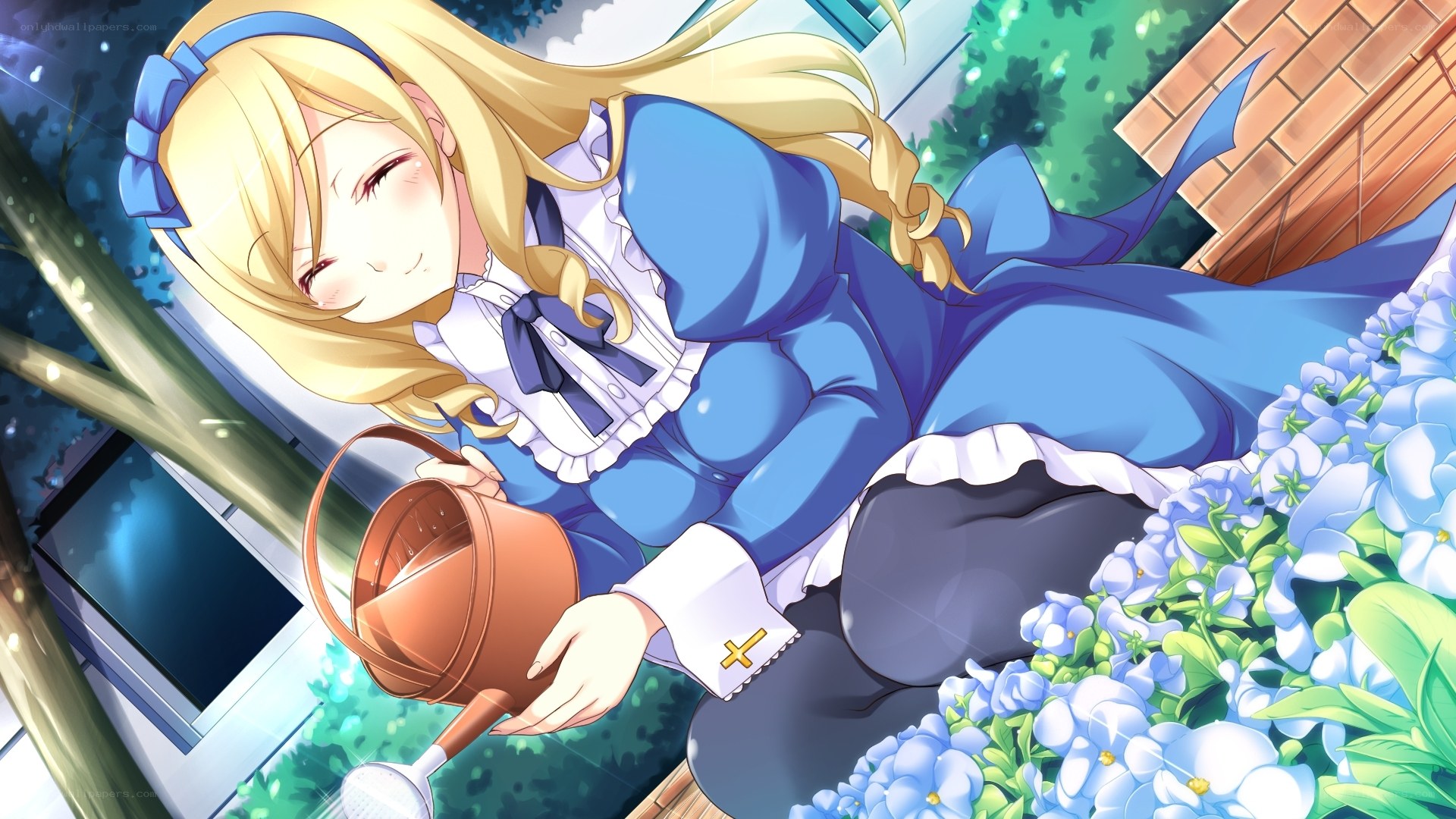 Blonde girl watering flowers